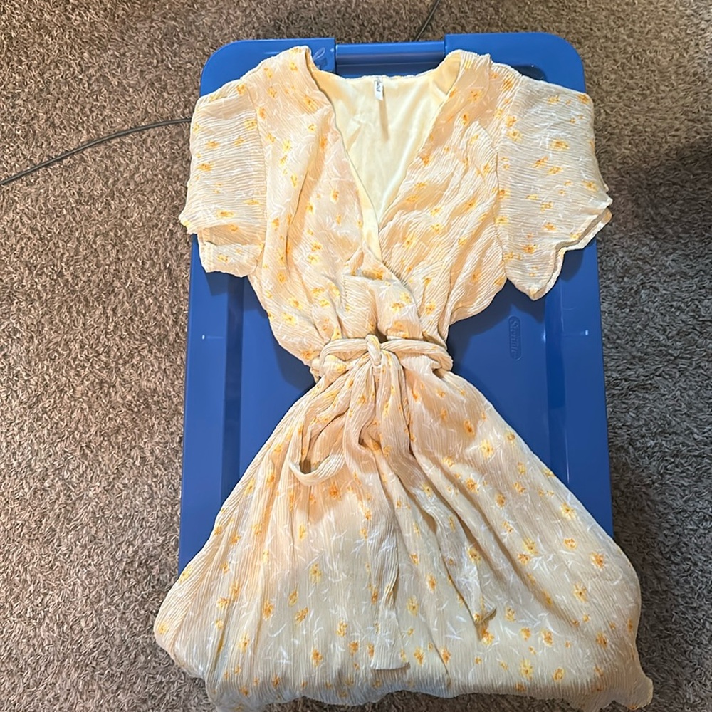 Yellow dress. Other picture is to show the style.